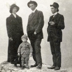 Vic standing with his mom and dad in Stanley Park, Vancouver, British Columbia near Valentines Day of 1915.