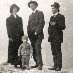 Vic standing with his mom and dad in Stanley Park, Vancouver, British Columbia near Valentines Day of 1915.