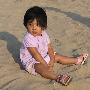 Angie playing in the sand