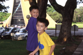 Arthur and Sebastian with Luce Memorial Chapel.