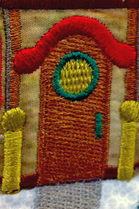 A door on an embroidered Christmas quilt displayed at the Illinois State Fair
