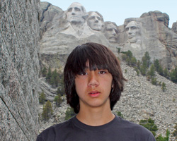 Arthur standing on stairs at Mt Rushmore