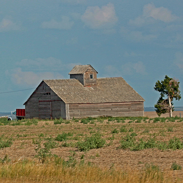 Ruin with car Western Kansas near Colorado border