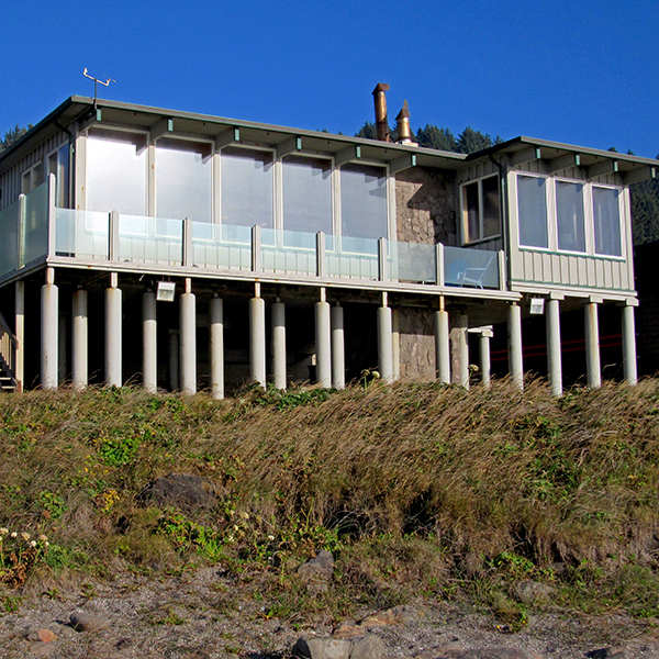 Our rented coast home in Yachats, as seen from the rocks by the sea.
