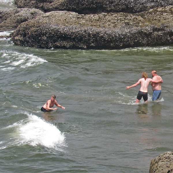 Jennell, Dante, and Jason are swimming in the Pacific Ocean. The ocean temperature was between 14 and 16 (mid-50s to about 60 degrees Fahrenheit). We didn’t swim for very long.