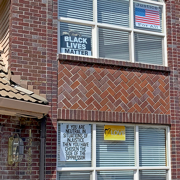 My mother’s home in Tigard, Oregon has signs in the windows.