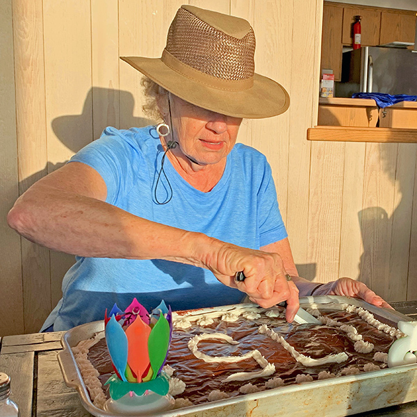 Mom with the cake for her 75th birthday.