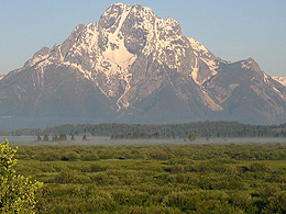 Teton Mountains rise up suddenly from a plain