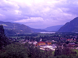 Valley with a village on a cloudy day