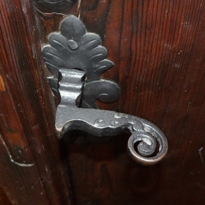 Curl tail pattern door handle from Queen Marie's castle in Bran, Romania.
