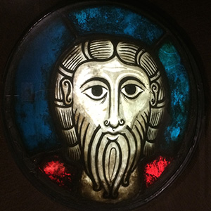 Wissembourg Head The Wissembourg Head is pale, with big eyes, and stylized hair framing the head, with a medium-length beard, and a long nose.