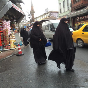 Two women wearing Burkas.