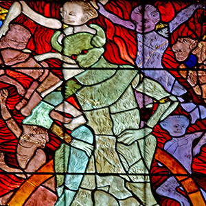 Demon in hell stained glass A demon with horns stands in hell, surrounded by tormented souls and other demons.