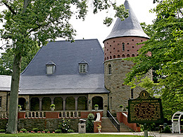 The Audubon museum with a round tower, built like a French chateau.