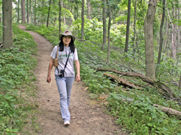 Chun-Chih walking in the woods
