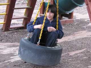 Arthur on tire swing