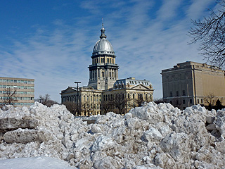 Piles of snow in front of the Illinois state capitol on February 20, 2011