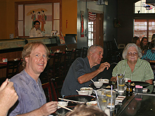 Eric with Uncle Bob and Aunt Lanni at Kikus