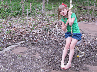 Niki on her backyard swing rope
