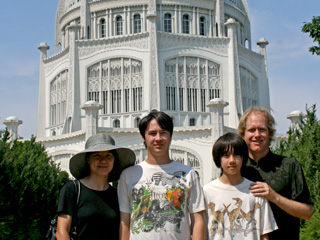 Posing as a family in front of Baha'i temple