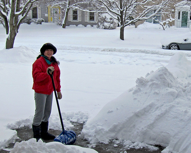 Jeri moving snow off driveway