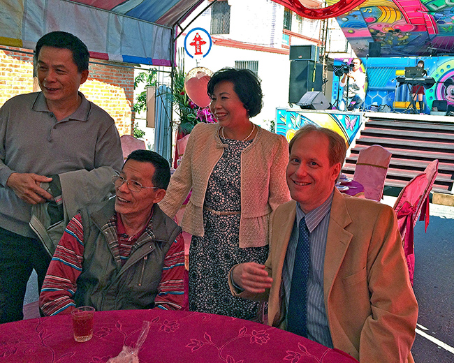 Eric with family at table