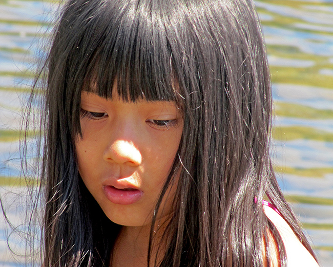 Close-up of Angie at the river