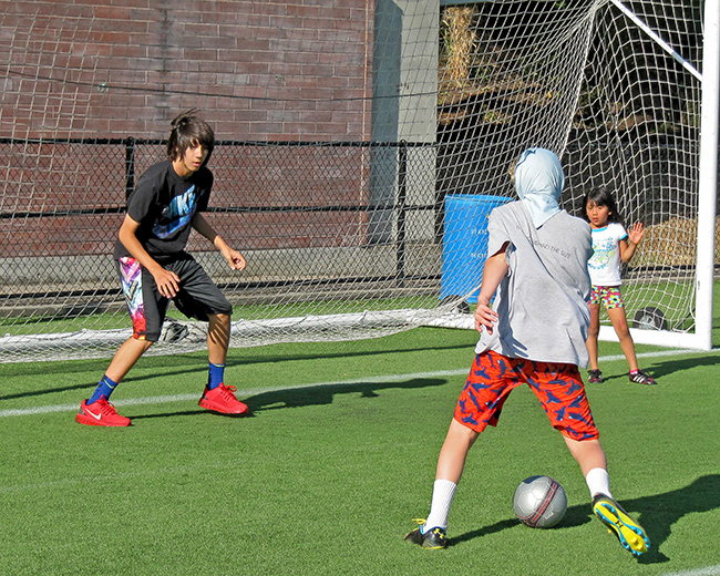 Arthur and Dante and Angie playing soccer