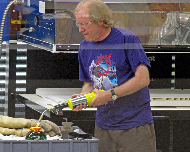 Eric working on glass