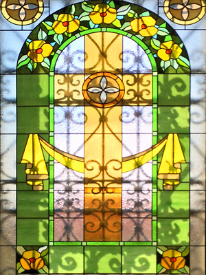 Kazanlak, Bulgaria window with green border and a yellow cross