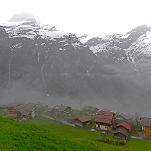Gimmelwald, Switzerland, a rainy evening in early May, with the valley in mist, and mountains dissappearing in the clouds.