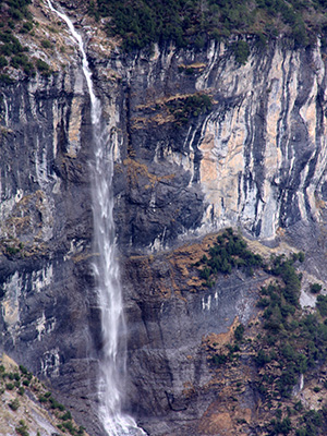 This is a waterfall in Switzerland, fowing down into the valley of the White Lütschine.