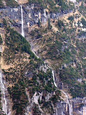 This is a waterfall in Switzerland, fowing down into the valley of the White Lütschine.