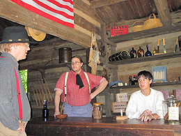 Men in an 1830s shop at New Salem village