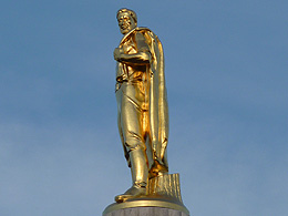 A golden statue atop the Oregon State Capitol