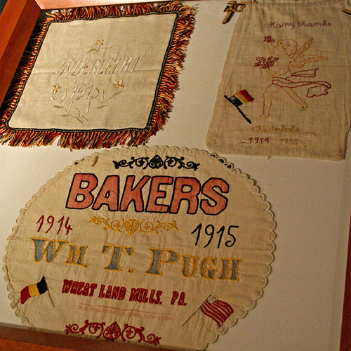 Embroidered flour sacks from the relief effort to feed the people of Belgium