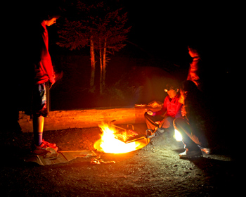 Standing around the campfire