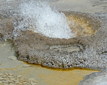 Water splashing from a little crater