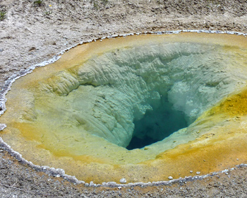 Pale blue and rust colors in a hot spring