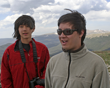 Boys on top of mountain