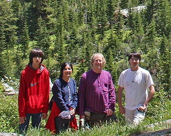 Family standing in a canyon