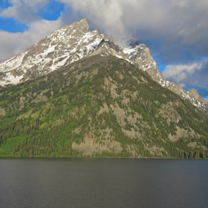Mountains looming up out of Jenny Lake