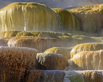 Hot water pouring over large travertine structures