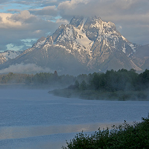 Mt Moran over Oxbow Bend at dawn with clouds