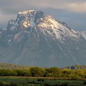 Mt Moran with sun shining on summit