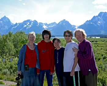 Posing with Tetons behind us, backlit