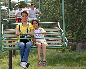 Xiuli and Yuehan on ski lift ride