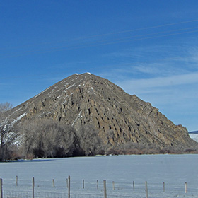 A rocky hill stands near Coalville, Wyoming