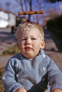 John in 1943, wearing a blue sweater in May