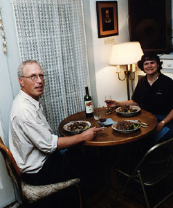 Bill F. and Katy D. sitting for dinner in the living room at Gimmham